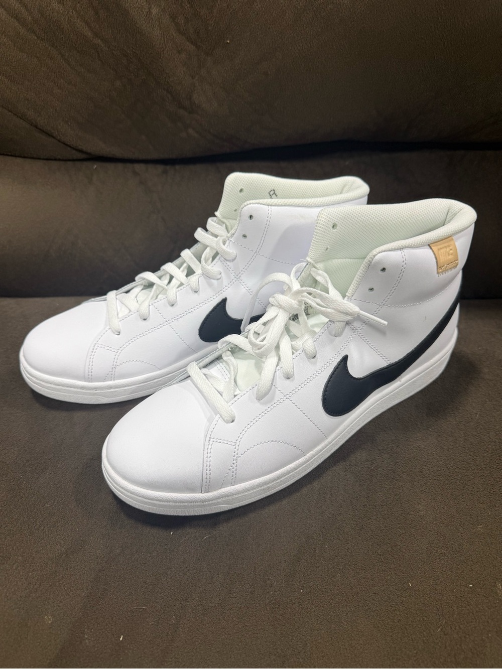 Nike Men’s White High-Top Sneakers with Black Swoosh